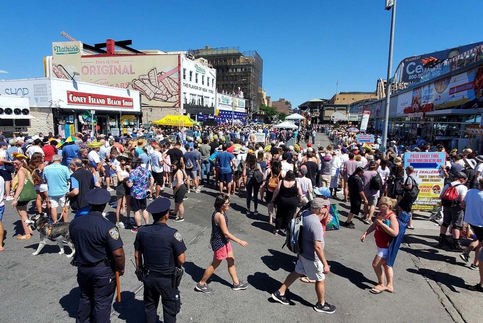 The hot dog eating contest was back at its traditional location outside Nathan