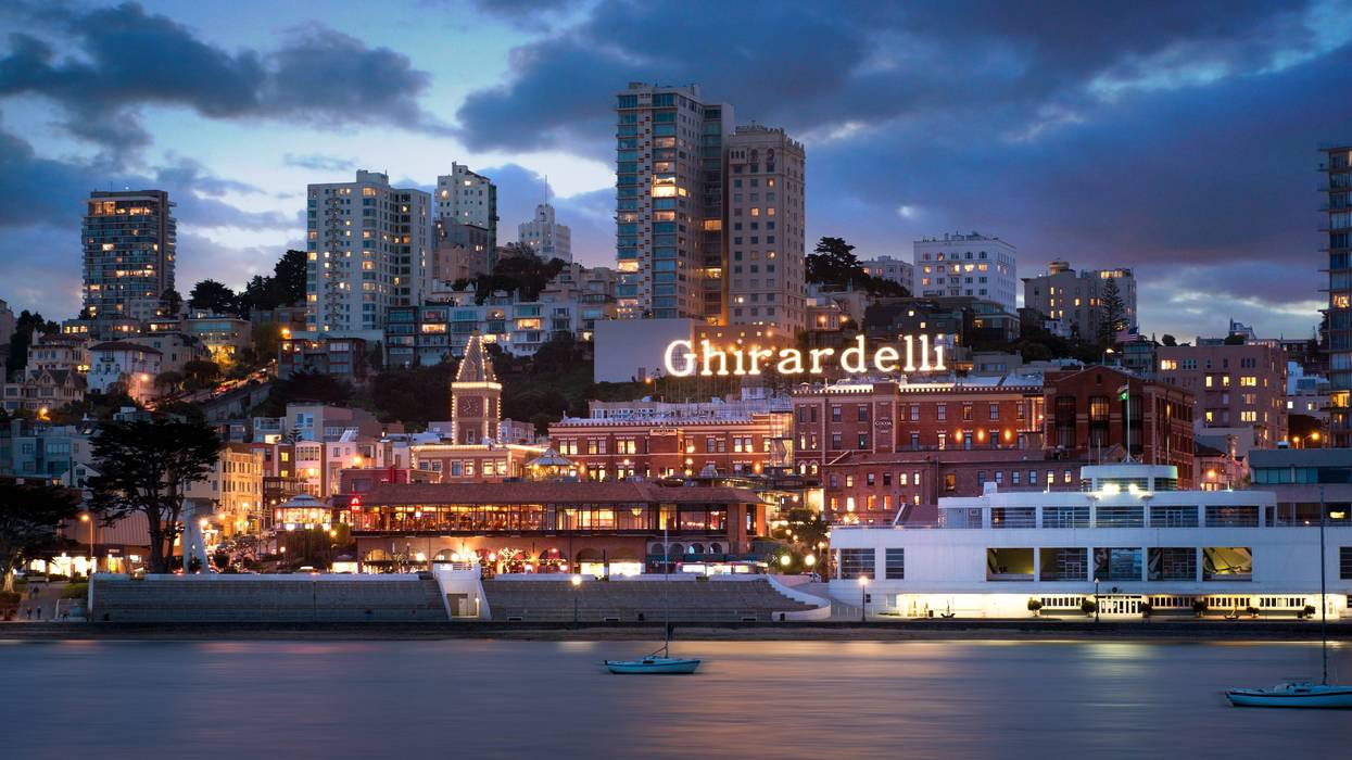 The iconic Ghirardelli sign lights up the waterfront in San Francisco.