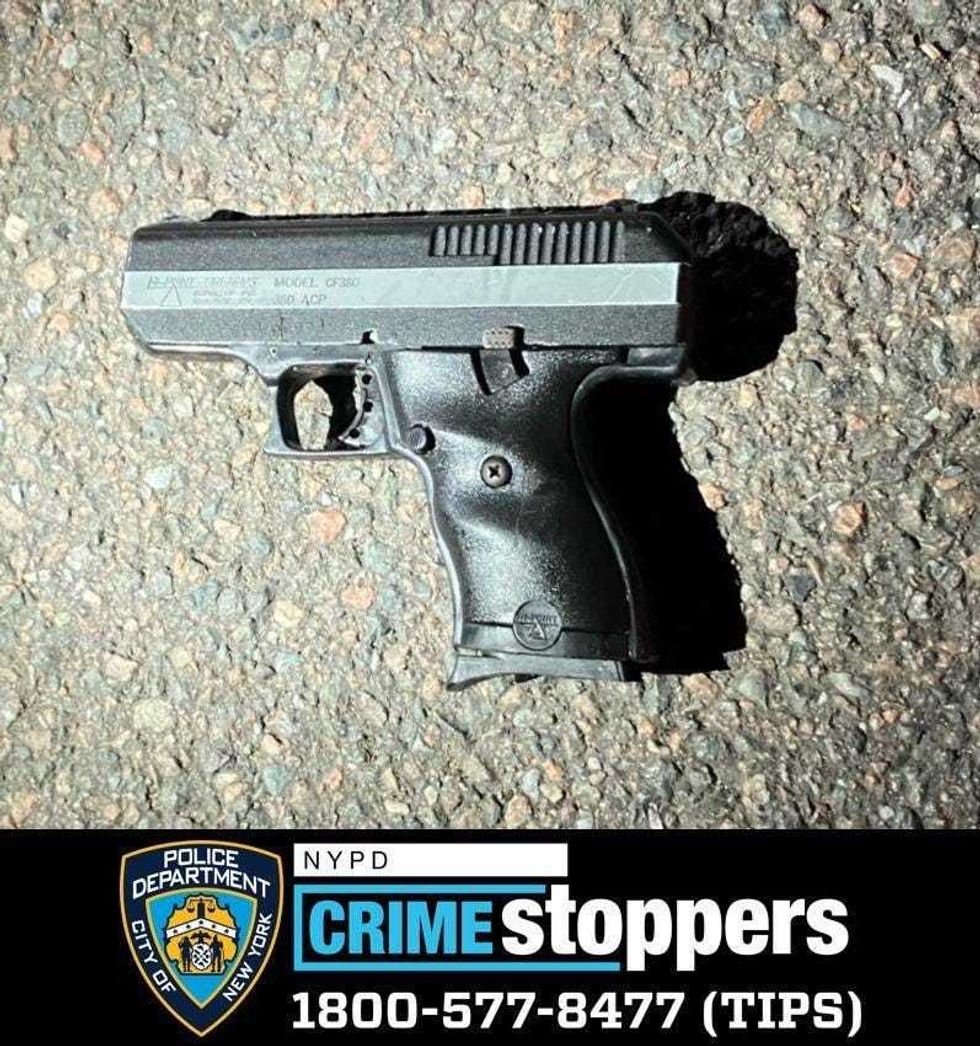 The illegally possessed gun allegedly used by the suspect.