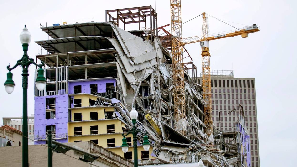 The implosion of two cranes at the Hard Rock Hotel in New Orleans, which partially collapsed during construction, was expected Saturday after a delay due to a tropical storm, officials said.