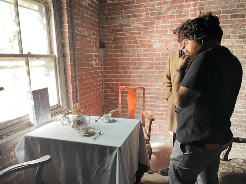 The infamous haunted tea set inside the carriage house of The Whitney