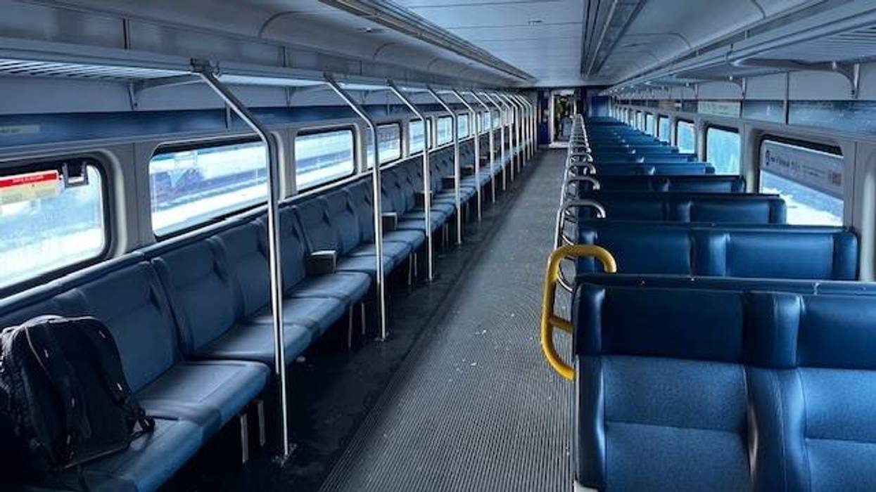 The interior of Montreal's Exo train, with longitudinal seating along one side of the car.