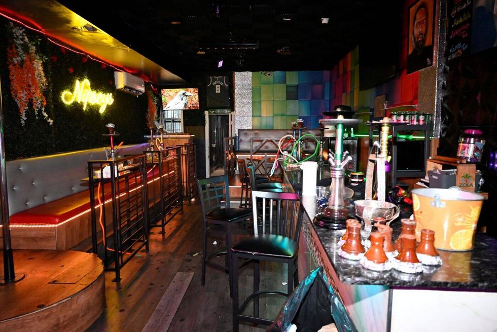 Judge temporarily closes lounge where off-duty police officer was shot to death