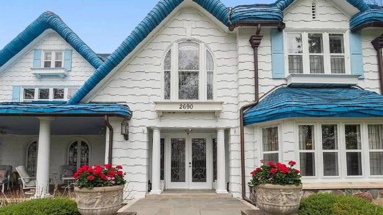 The "landmark home" is set to sell for a total of $4,199,000. This enchanting home is described as "reminiscent of the Cotswold style sits on almost 3 acres of property and offers 175 feet of all sports Pine Lake frontage, and 187' on Pine Lake Golf course, a 7 car garage and Bloomfield Hills Schools."