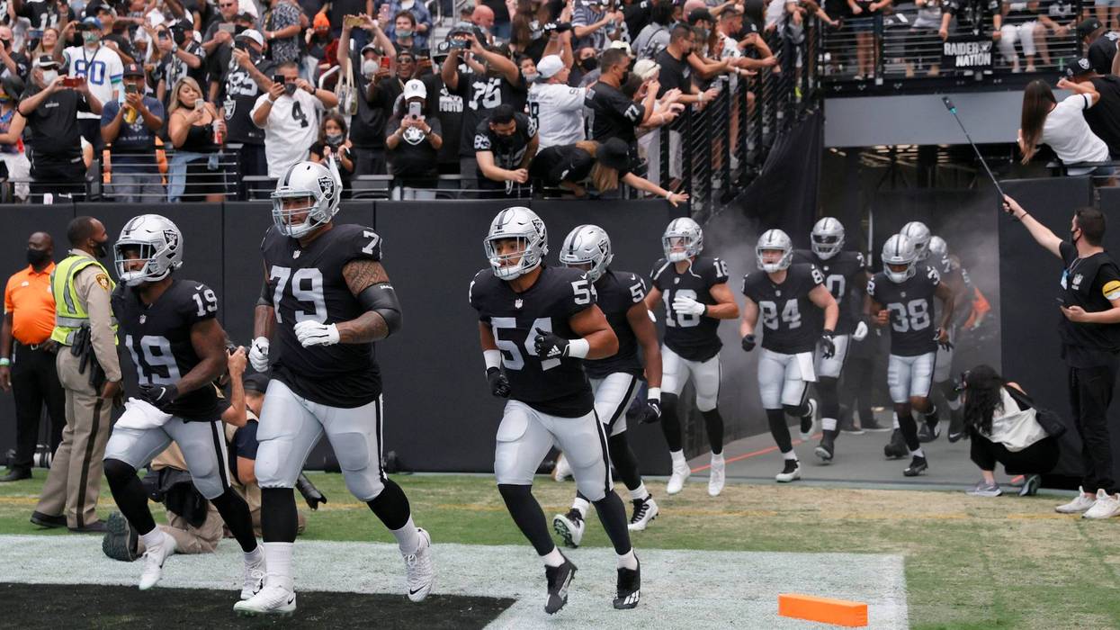 The Las Vegas Raiders take the field against the Seattle Seahawks on August 14th, 2021, at Allegiant Stadium