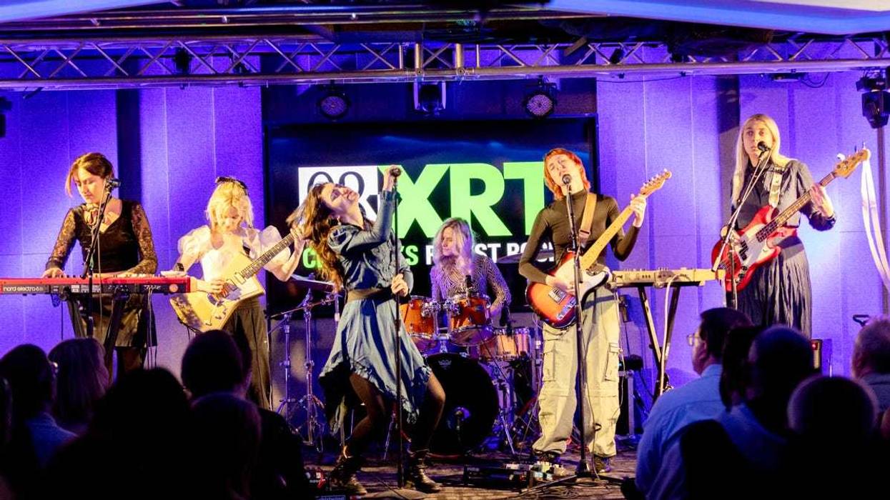 The Last Dinner Party performs at 93XRT on November 9, 2023 (l-r: Aurora Nishevci, Emily Roberts, Abigail Morris, Rebekah Rayner, Lizzie Mayland, Georgia Davies)