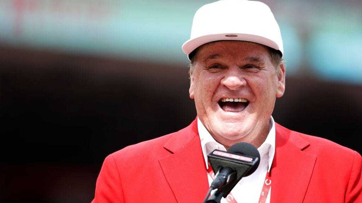 The late Cincinnati Reds great, Pete Rose, reacts during a statue dedication ceremony prior to a game against the Los Angeles Dodgers at Great American Ball Park on June 17, 2017 in Cincinnati, Ohio.