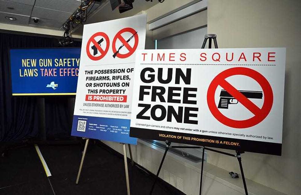 The laws contain strengthened background checks and firearm safety and live-fire training for individuals seeking to obtain concealed carry permits; prohibit concealed carry permit holders from bringing their firearms into sensitive locations, including Times Square, bars, libraries, schools, government buildings and hospitals, among others; and require renewal or recertification of permits every three years