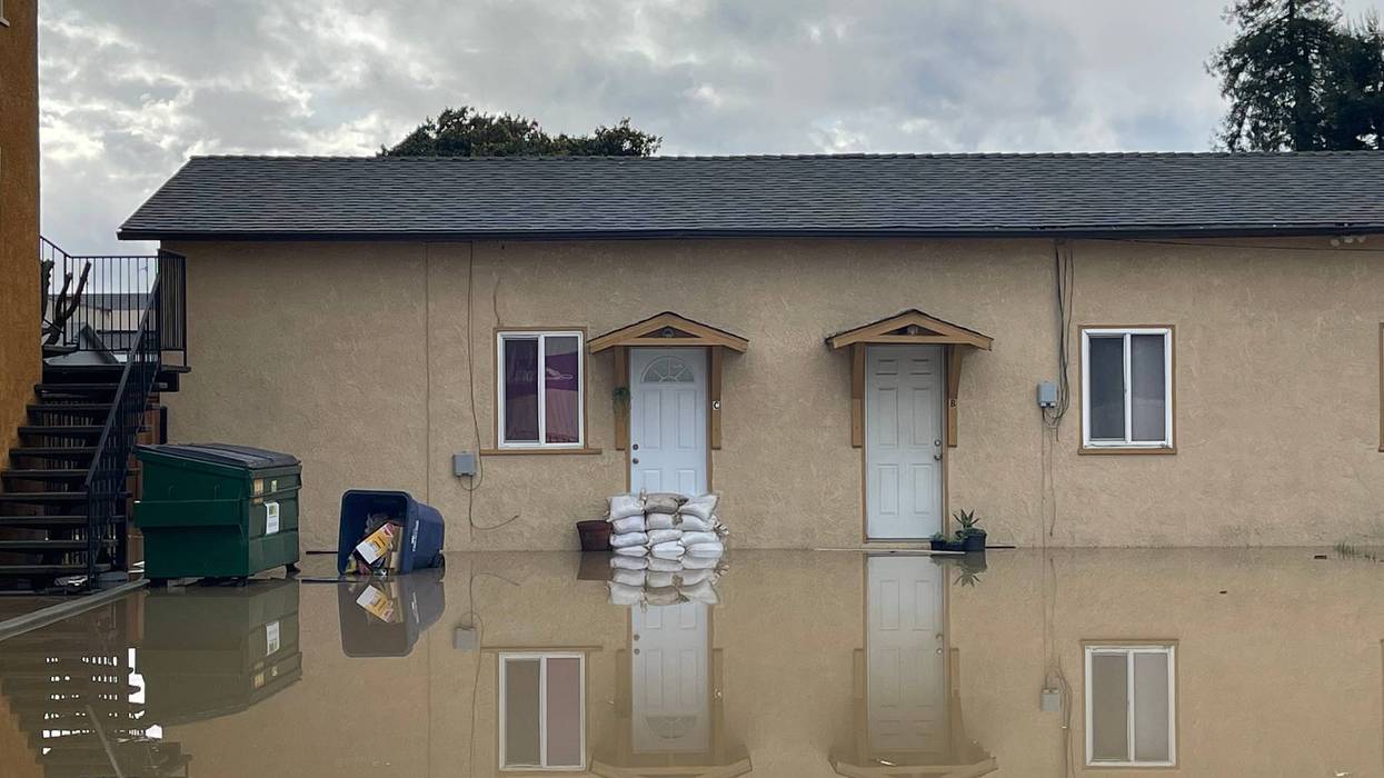 The levee breaking led to massive damage in the small town.