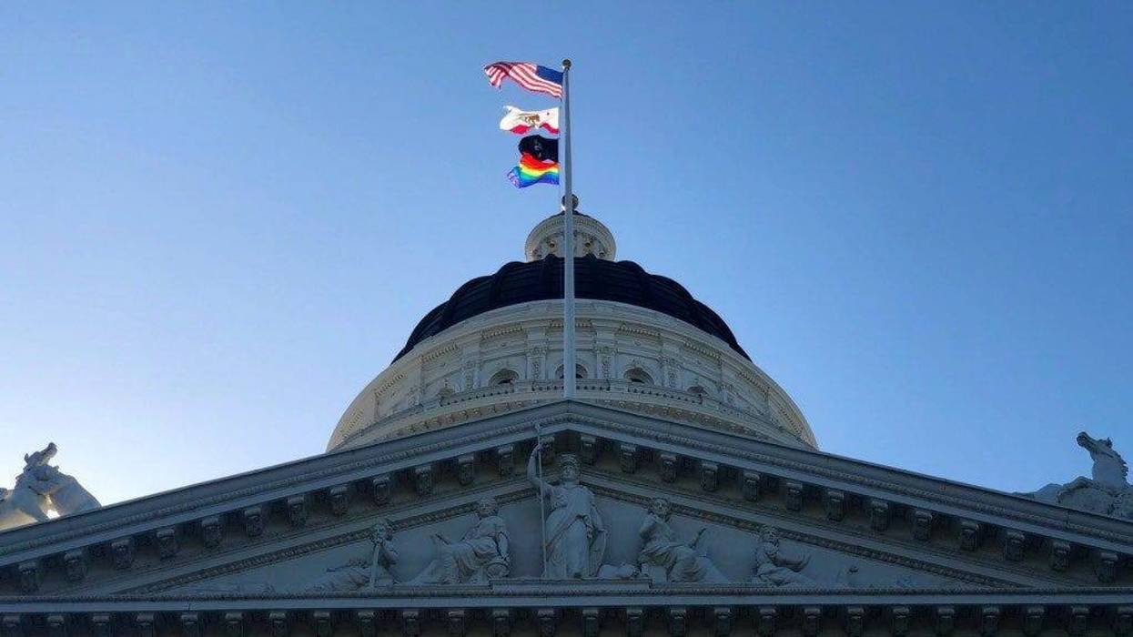 The LGBTQ pride flag flies at the California state capitol in Sacramento on June 17, 2019.