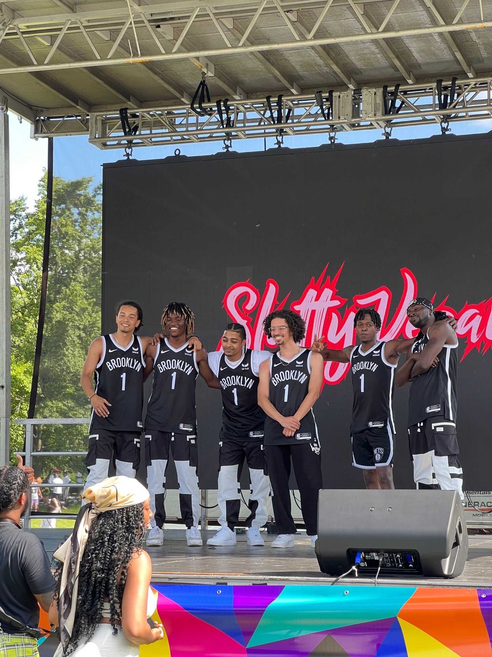 The Little Torches team onstage at Sunday