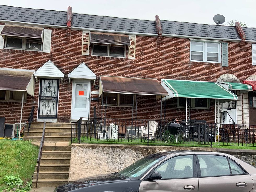 The location where, police say, bullets were fired between rowhouses in a gun incident.