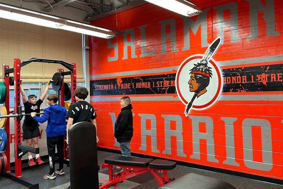 The logo of the Salamanca City Central School District is featured in the weight room at Salamanca High School in Salamanca, N.Y., on April 18, 2023