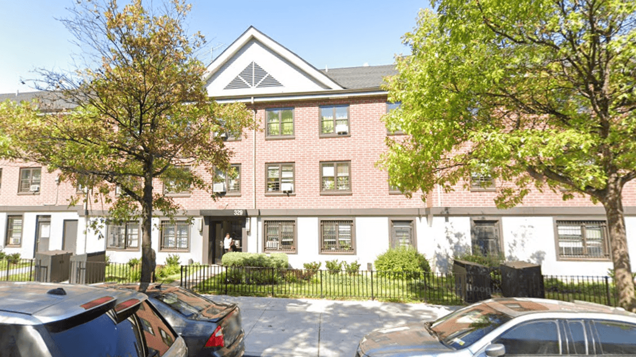 The Louis Armstrong Houses building where a 46-year-old man was fatally shot during a domestic dispute on Saturday.
