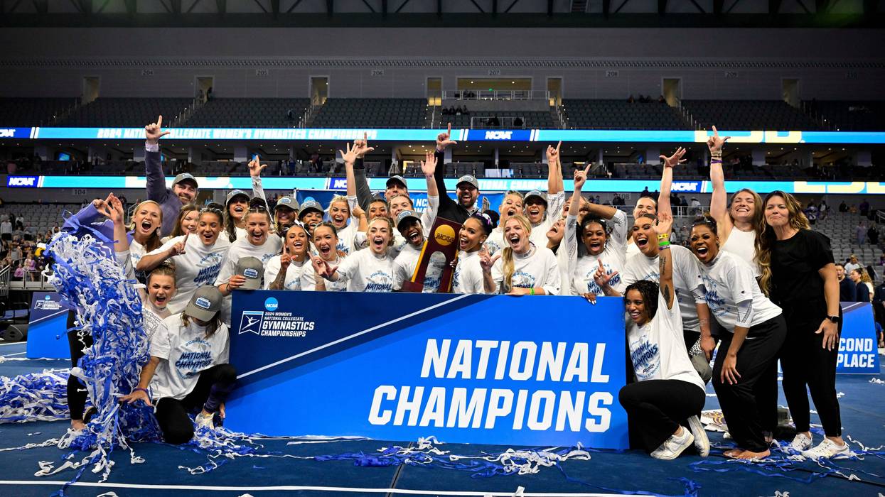 The LSU Tigers gymnastics team celebrates after winning the national championship