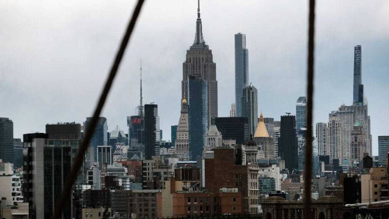 The Manhattan skyline looms over the East River on March 28, 2022 in New York City.
