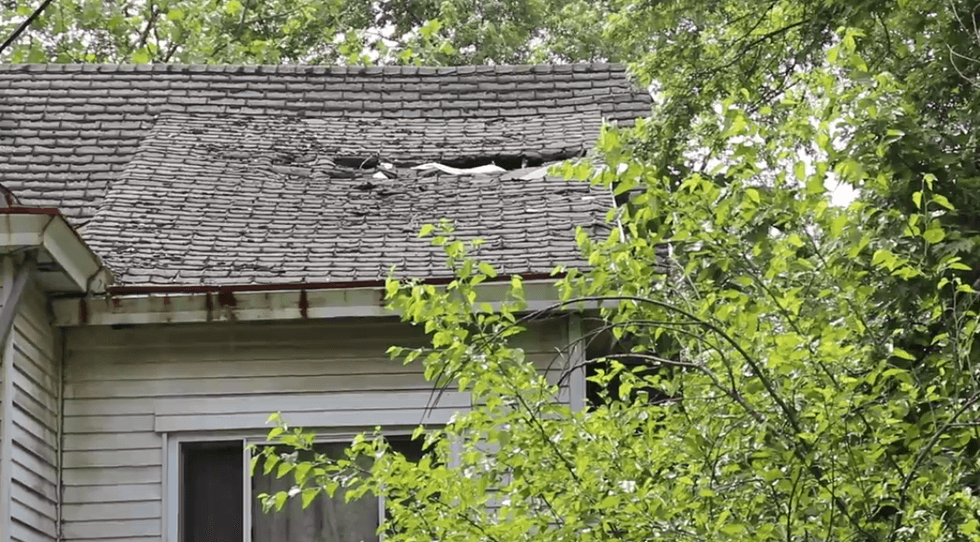 The Mann brothers house had gaping holes in the roof that allowed rain to leak inside and collapsed the second floor ceilings.