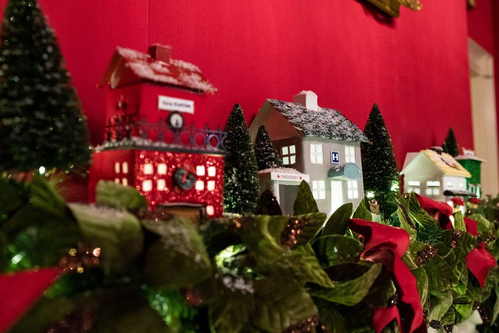The mantle of the Red Room of the White House is decorated for the Christmas season in honor of our Nation