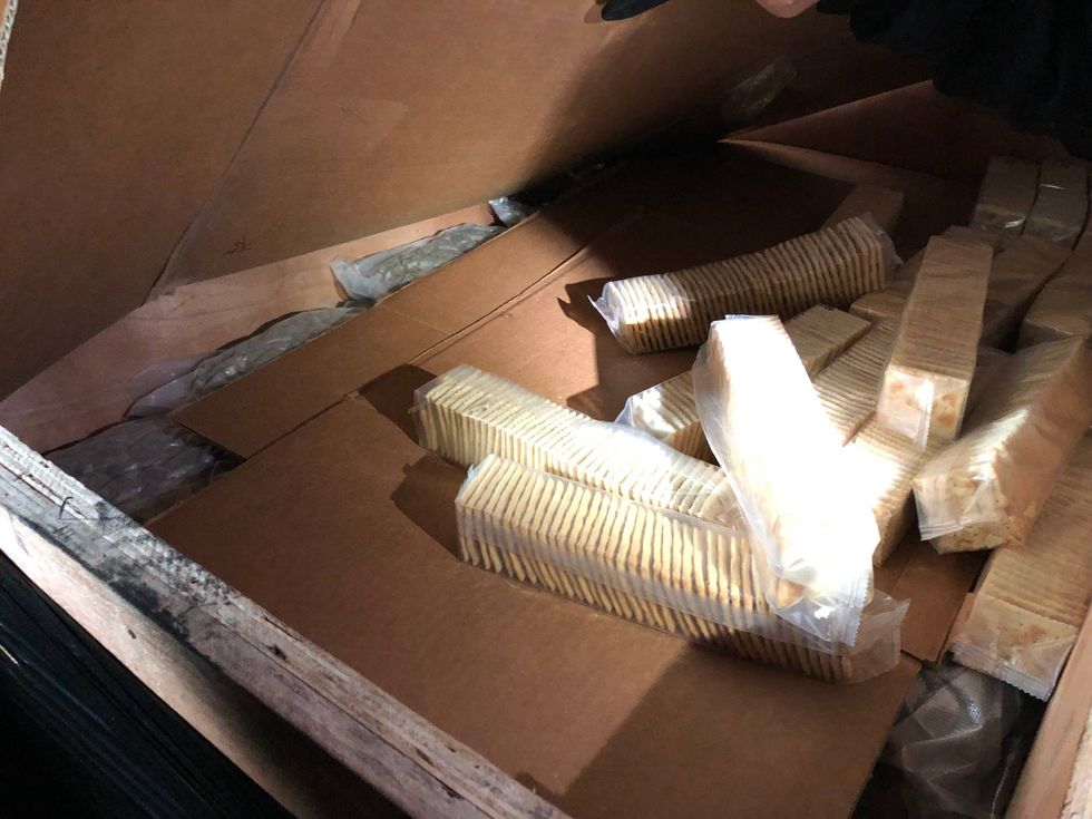 The marijuana hidden beneath food items