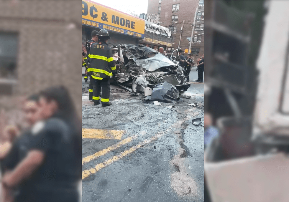 The minivan with charred and heavily damaged after the crash