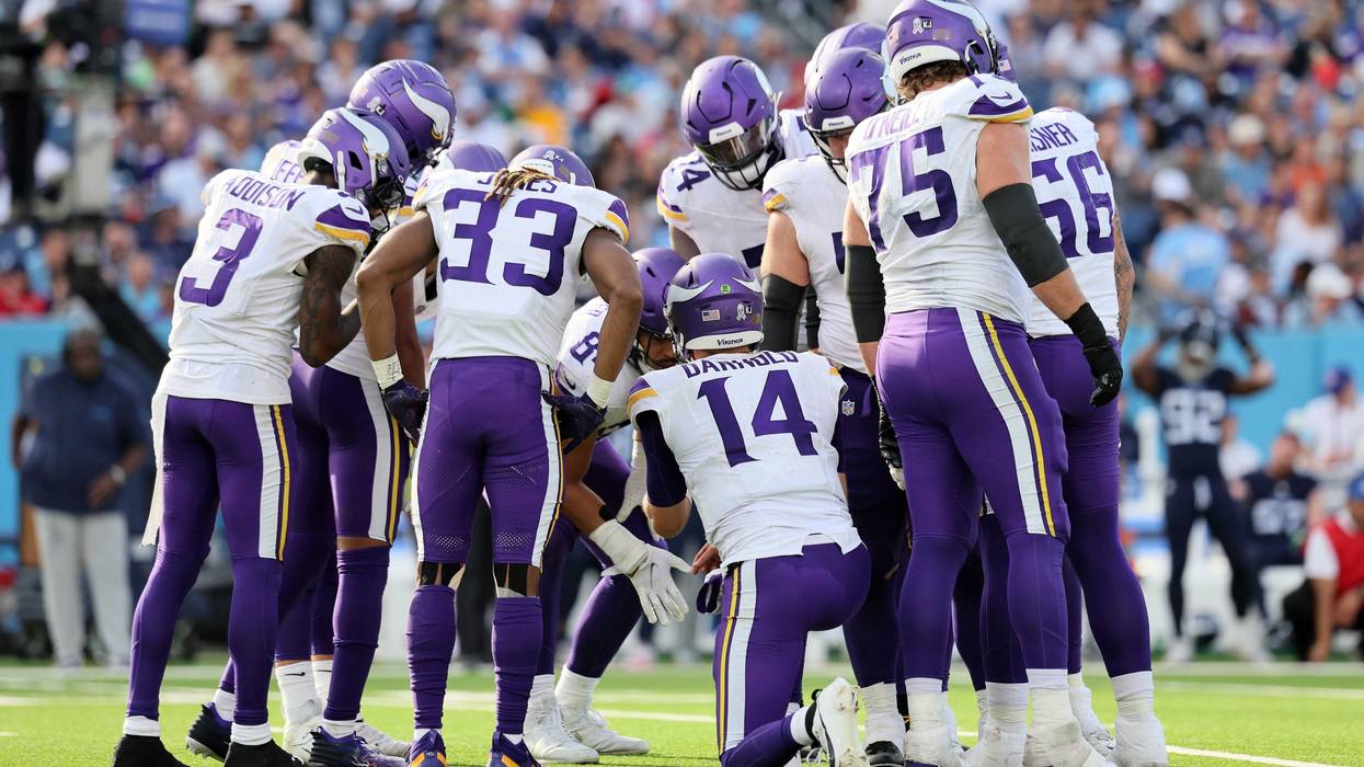 The Minnesota Vikings offense huddles before a play during the second half of a game against the Tennessee Titans at Nissan Stadium on November 17, 2024 in Nashville, Tennessee.