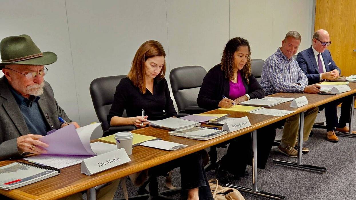 The Missouri Ethics Commission meeting Oct. 16 at its Jefferson City offices. Members at the time, from left, were Jim Martin, Whitney Smith, Robin Wheeler Sanders and Jeremy Schneider. Attorney Scott Pool, the commission’s counsel, is at the far right.