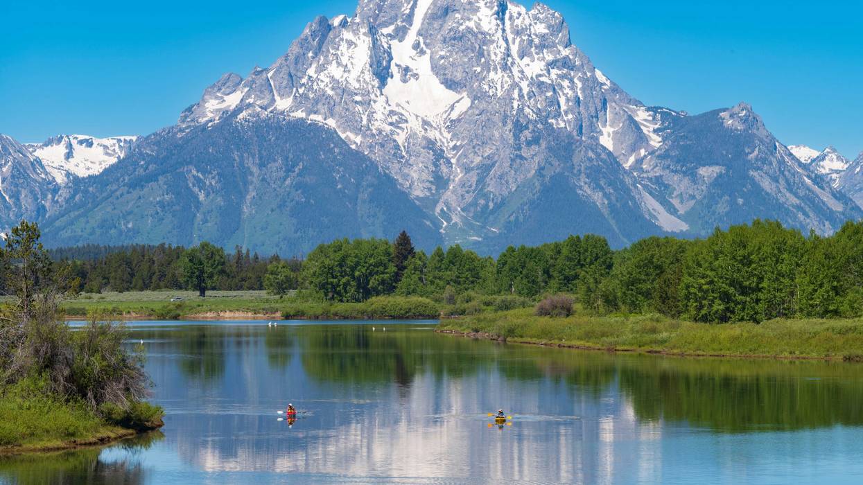 The mountain range of Grand Teton National Park is photographed during a morning with the peaks' reflections in Snake River where Wesley Dopkins, 43, of St. Paul, was last seen paddling on June 15, 2024.