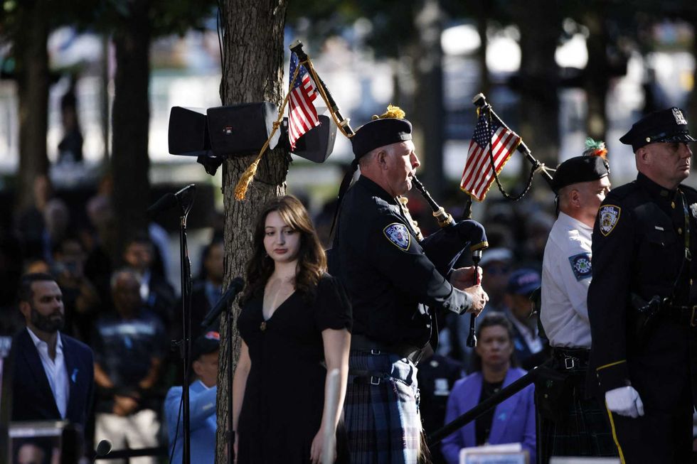 The names of the victims of the 9/11 terror attack are read during a remembrance ceremony on the 23rd anniversary of the September 11 terror attacks