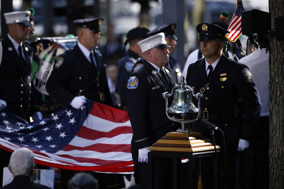 The names of the victims of the 9/11 terror attack are read during a remembrance ceremony on the 23rd anniversary of the September 11 terror attacks