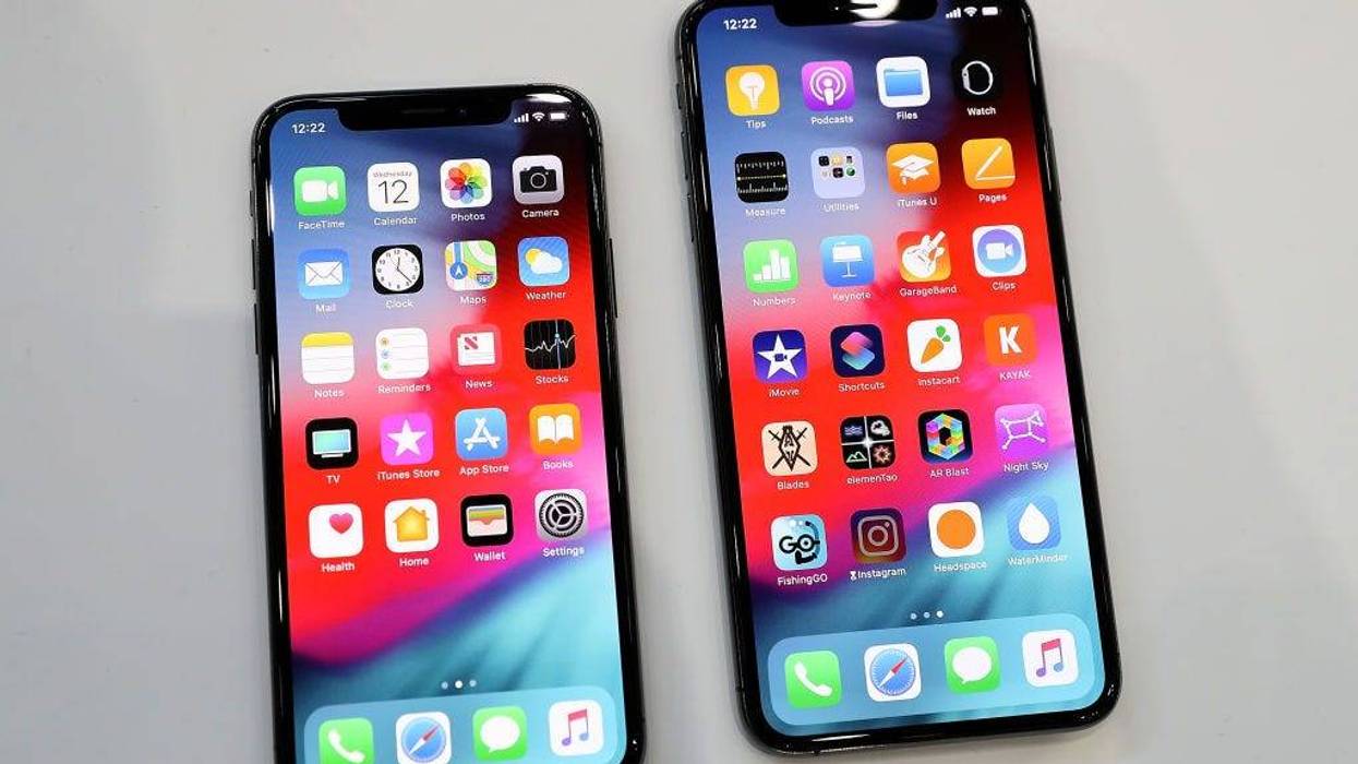 The new Apple iPhone Xs (L) and iPhone Xs Max (R) are displayed during an Apple special event at the Steve Jobs Theatre on September 12, 2018 in Cupertino, California.