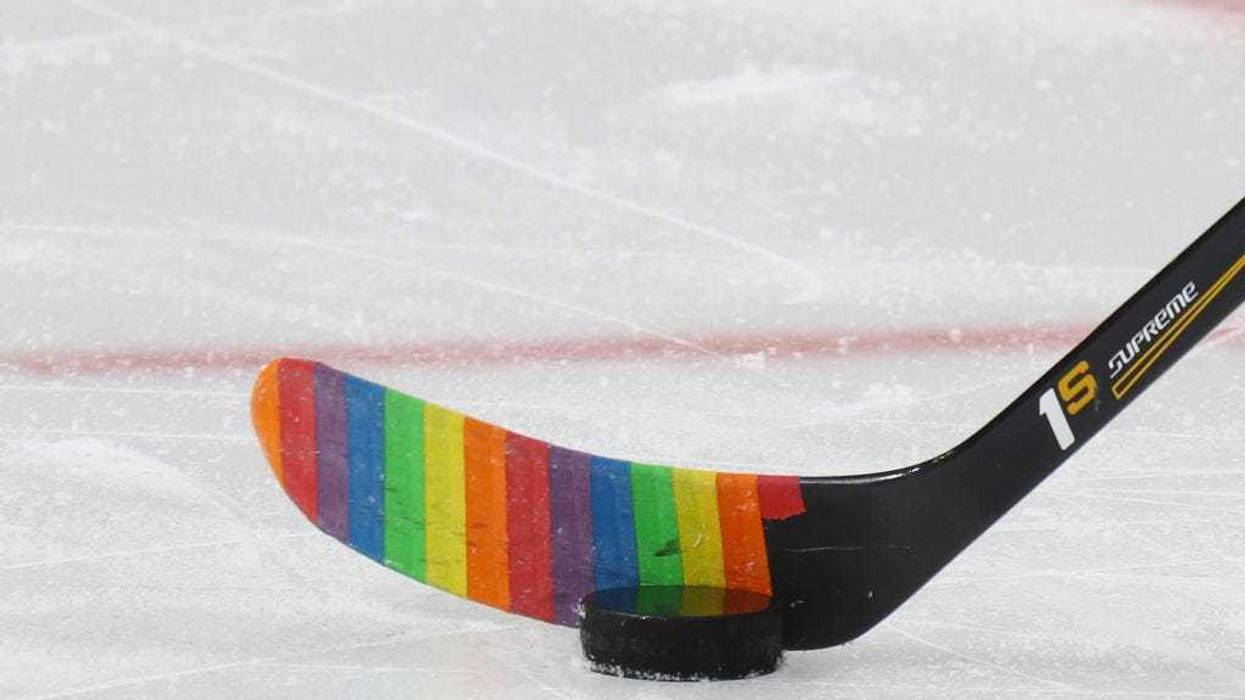 The New Jersey Devils skate in warm-ups prior to the game against the Montreal Canadiens with their sticks decorated for "Hockey is for Everyone" pride night at the Prudential Center on February 27, 2017 in Newark, New Jersey.