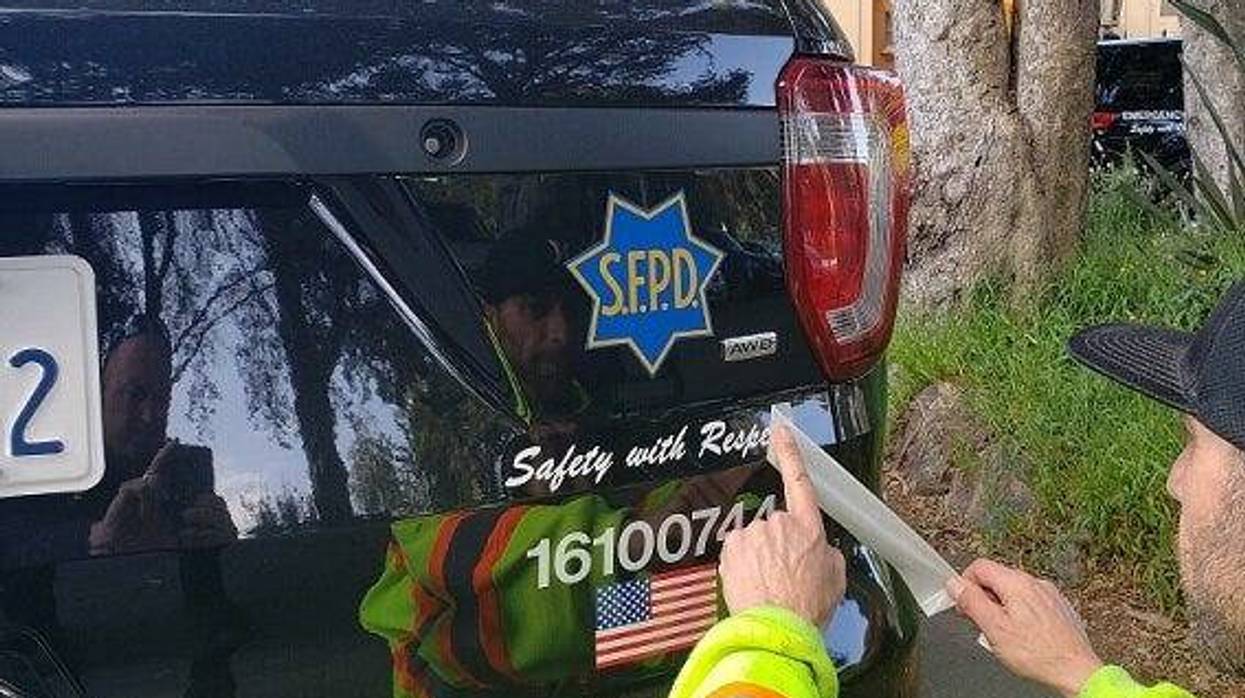 The new motto of the San Francisco Police Department — "Safety and Respect" — has been added to patrol cars.
