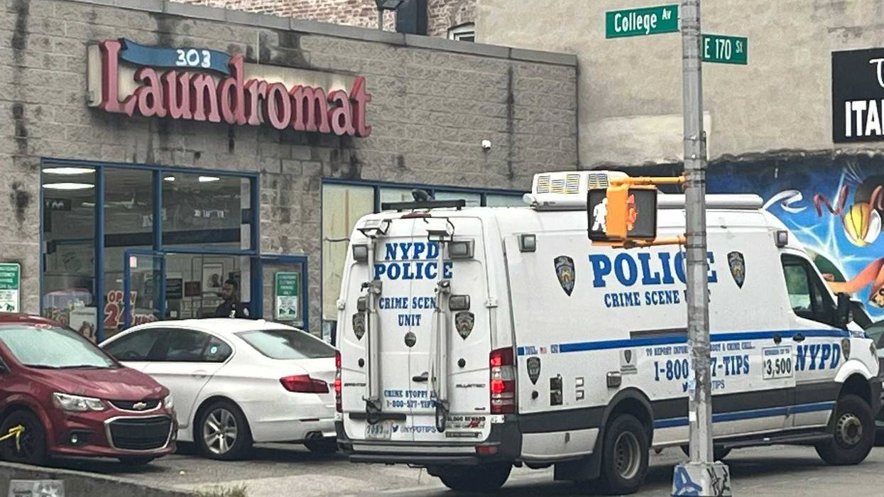 The NYPD continued to investigate at the 303 Laundromat on Thursday
