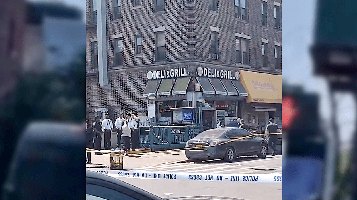 The NYPD investigated at the scene of a double shooting Wednesday in Crown Heights