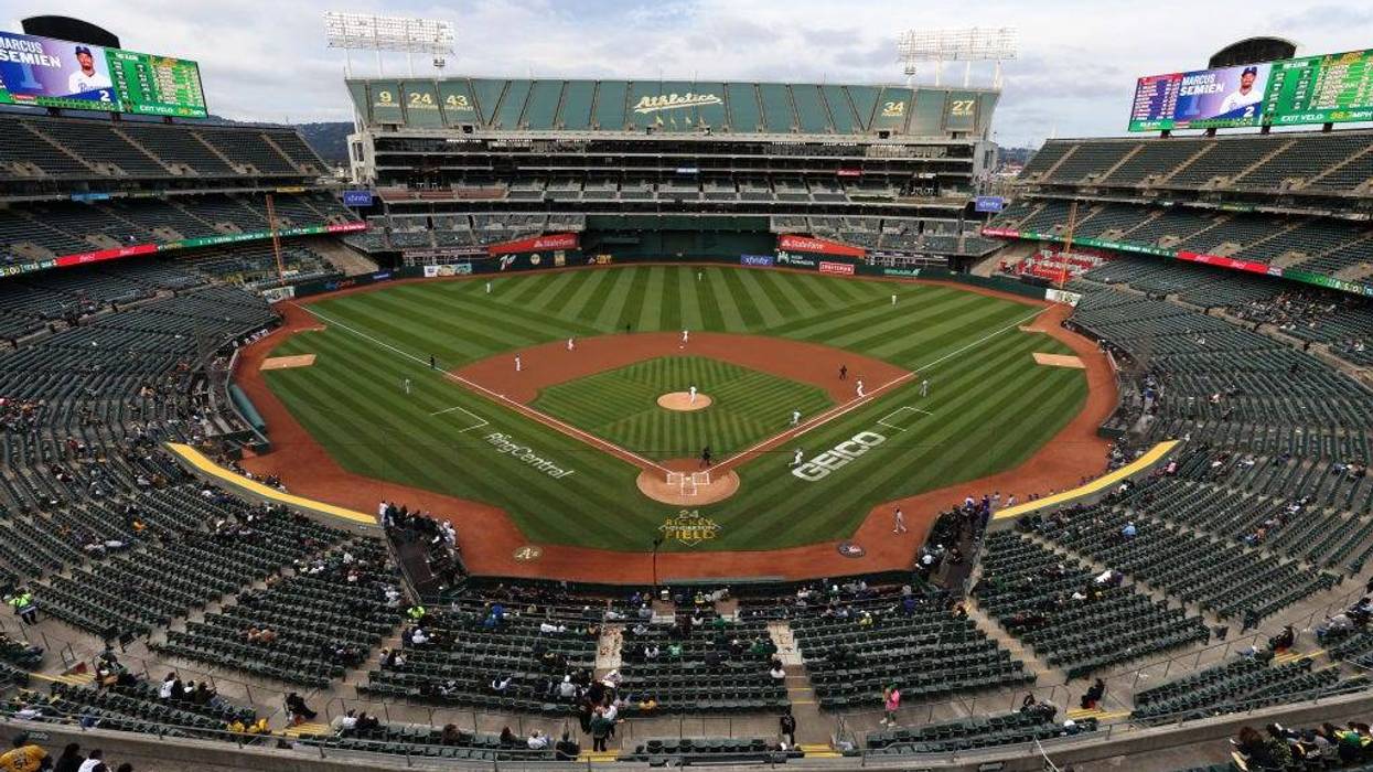 The Oakland Athletics play the Texas Rangers at a nearly empty RingCentral Coliseum on May 26, 2022 in Oakland, California.