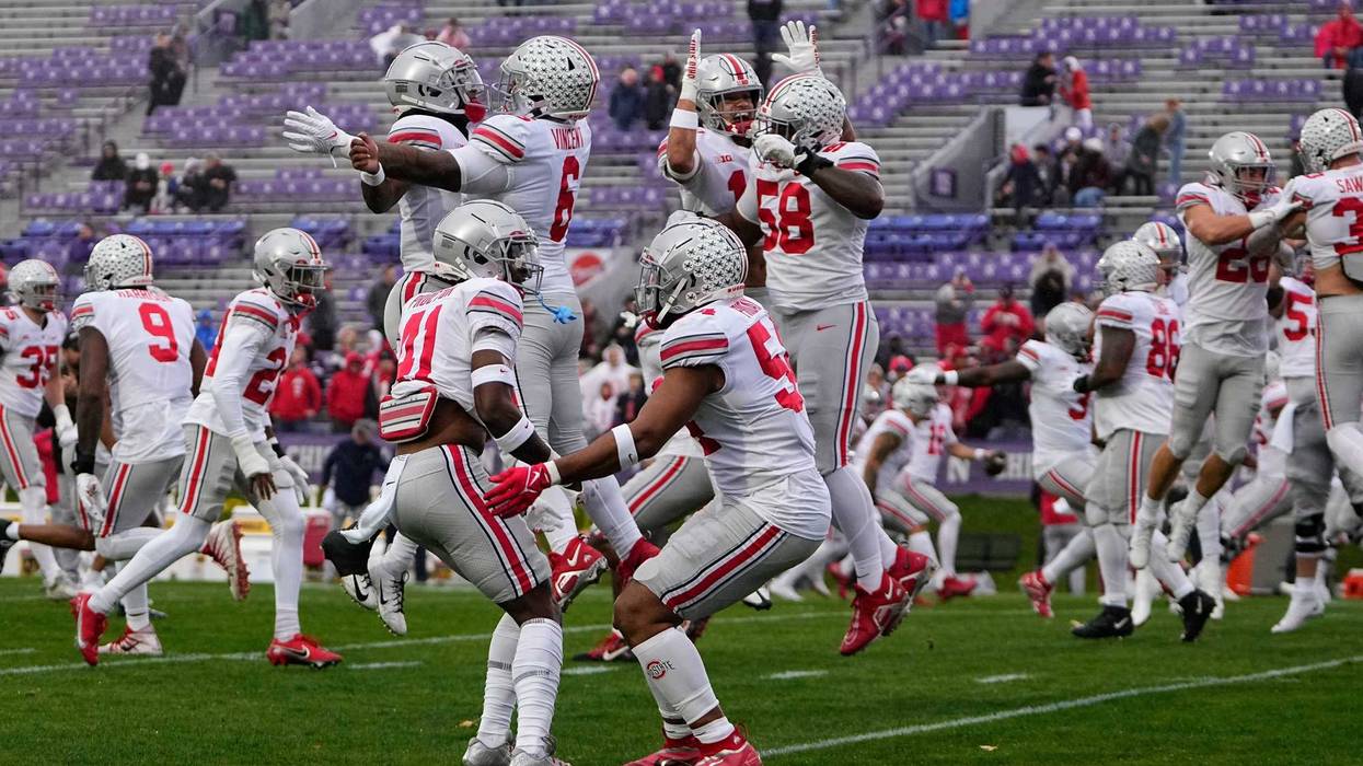 The Ohio State Buckeyes warm up prior to the NCAA football game against the Northwestern Wildcats at Ryan Field.