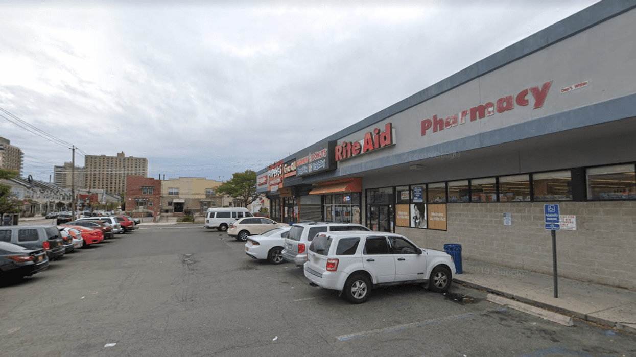 The parking lot in front of the small strip mall where a 17-year-old boy was fatally stabbed on Friday.