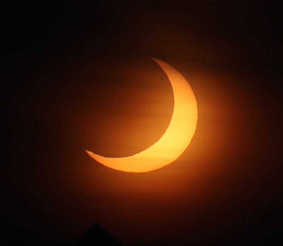 The partial solar eclipse over Putnam County on Thursday morning