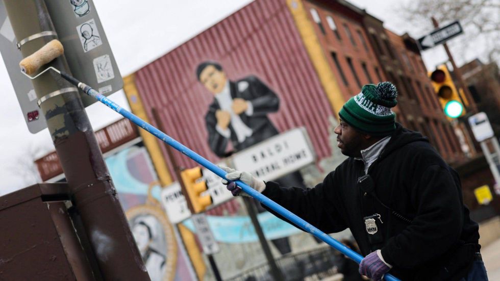 The Philadelphia Police Department uses gear oil to grease up the poles on downtown streets to minimize the damage that fans can do to the city and themselves in the aftermath of the Super Bowl LII victory.