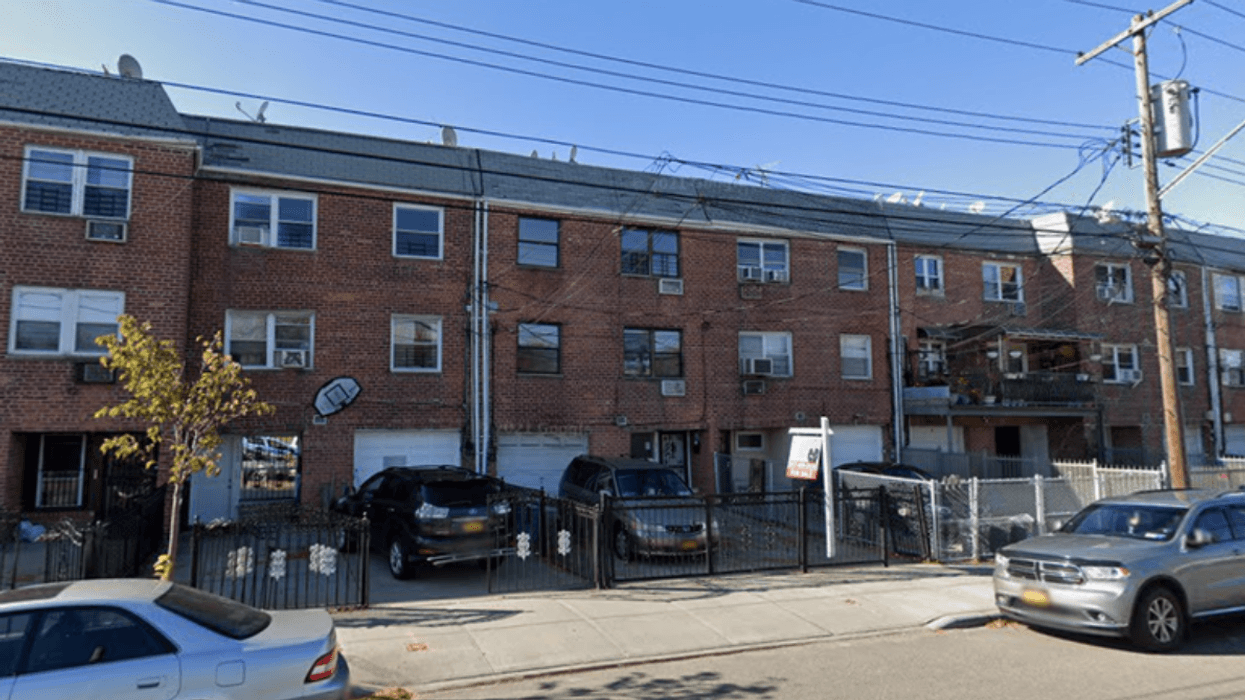 The Queens apartment building where an 8-year-old girl was killed and two adults were hospitalized in a fire.