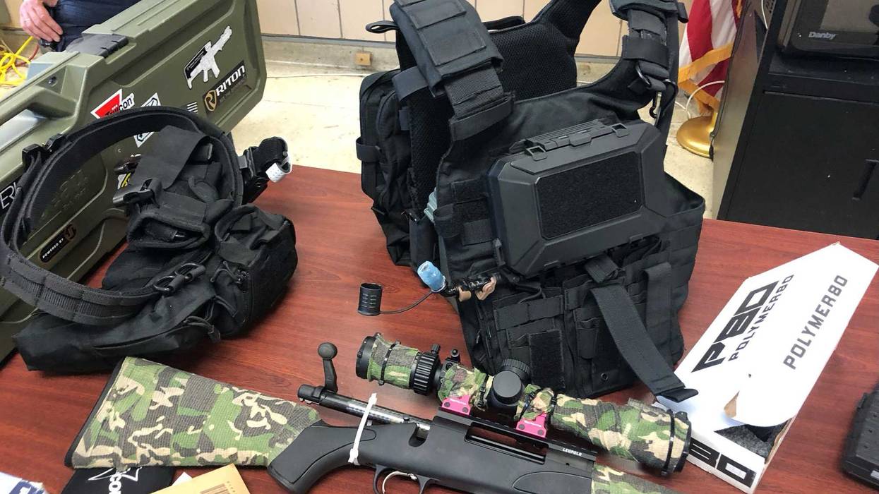 The Queens District Attorney's Office displayed the Flushing man's weapons arsenal and high-tech accessories.
