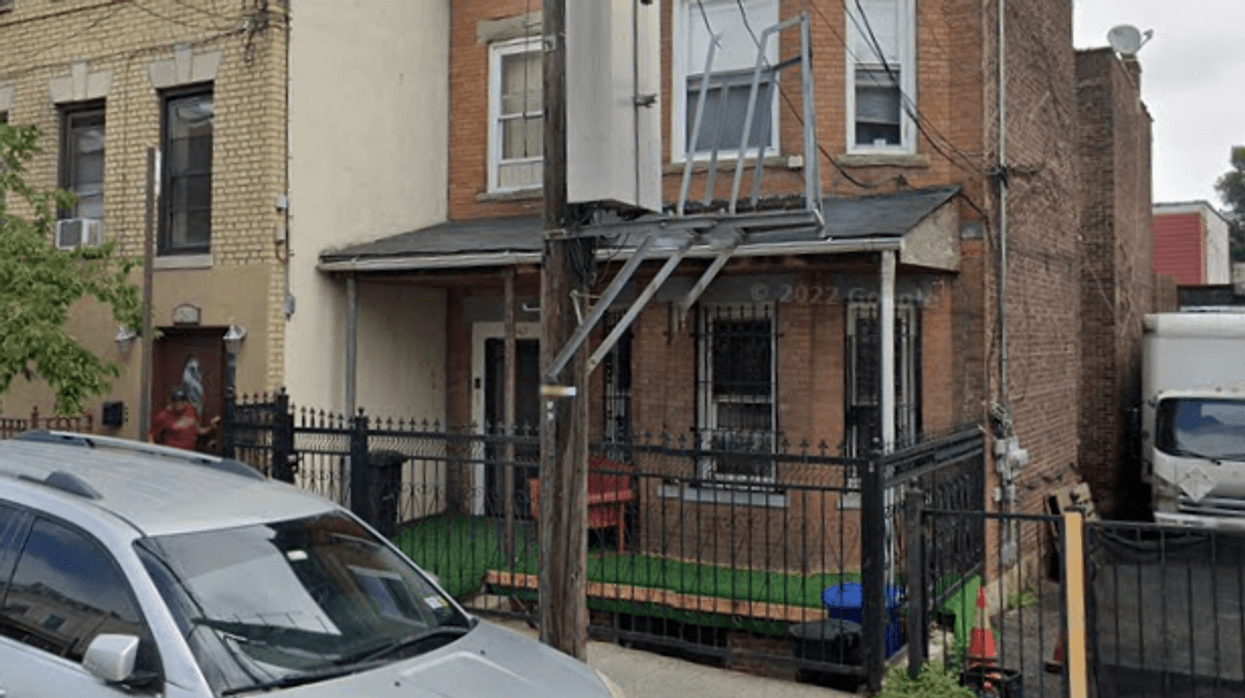 The Queens home where a 58-year-old woman was found dead a day after her son's corpse was discovered nearby.