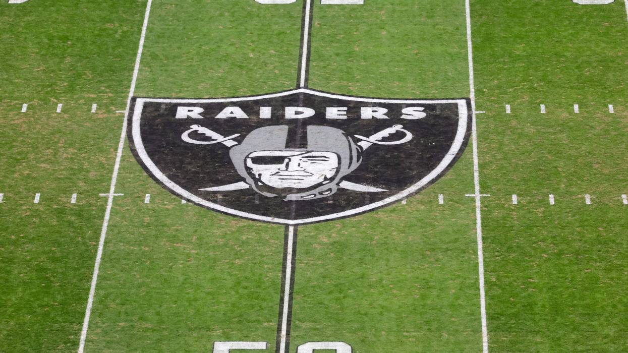 The Raiders logo on the field at Allegiant Stadium