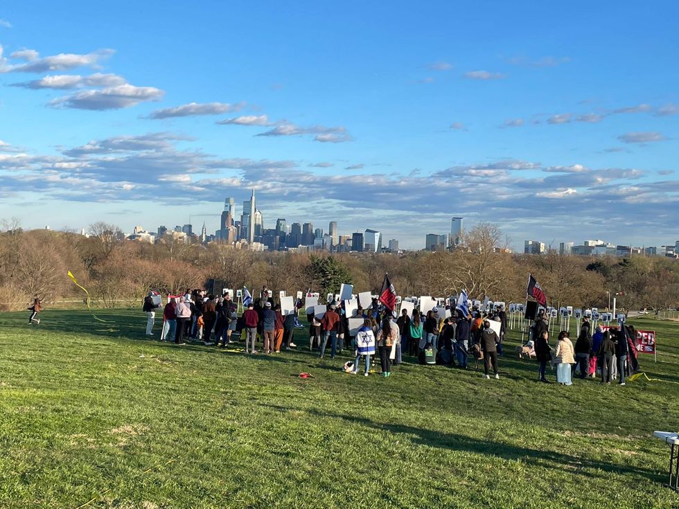 The rally in Fairmount Park for Israeli hostages looking at the skyline of Philadelphia.