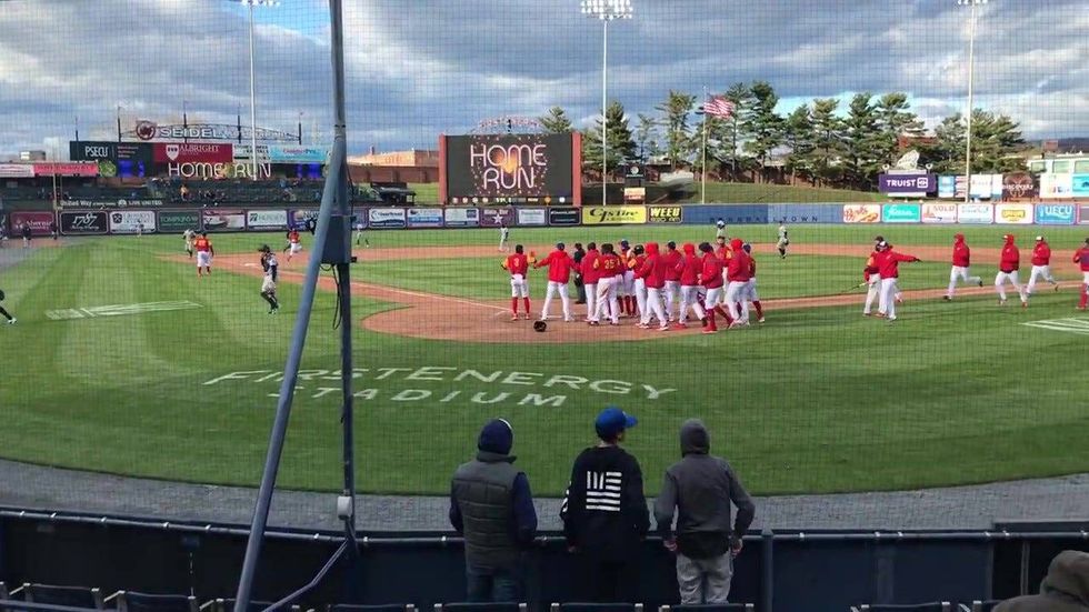 The Reading Fightin Phils celebrate a walk-off home run in their win over the Somerset Patriots on April 10, 2022.