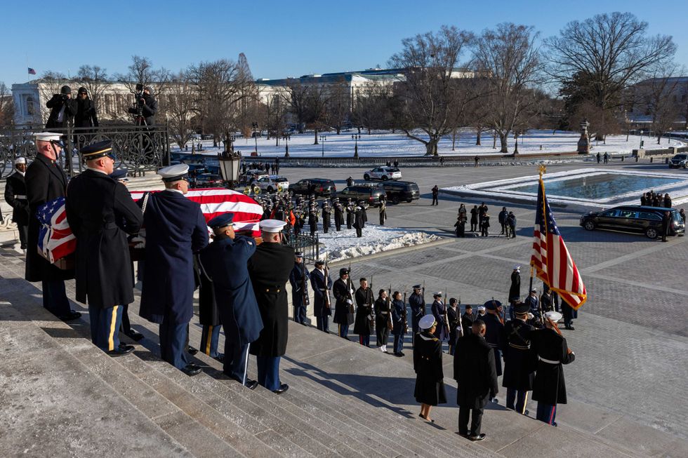 The remains of former US President Jimmy Carter leave the US Capitol for the State Funeral Service at the Washington National Cathedral in Washington, DC, on January 9, 2025