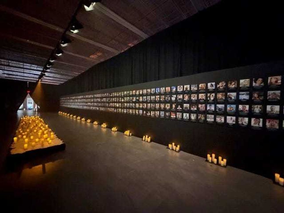 The remembrance wall of everyone killed at the Nova Music Festival on 10-7-2023