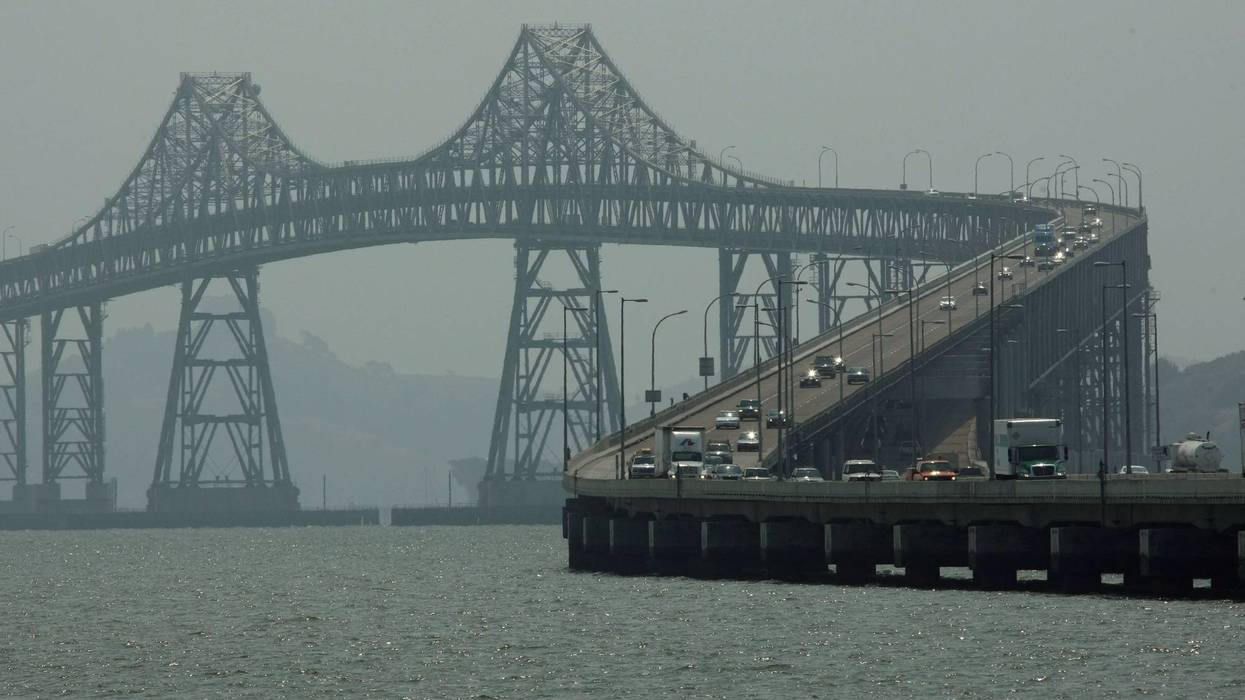 The Richmond-San Rafael bridge is barely visible through hazy smoke-filled air June 25, 2008 in San Rafael, California.