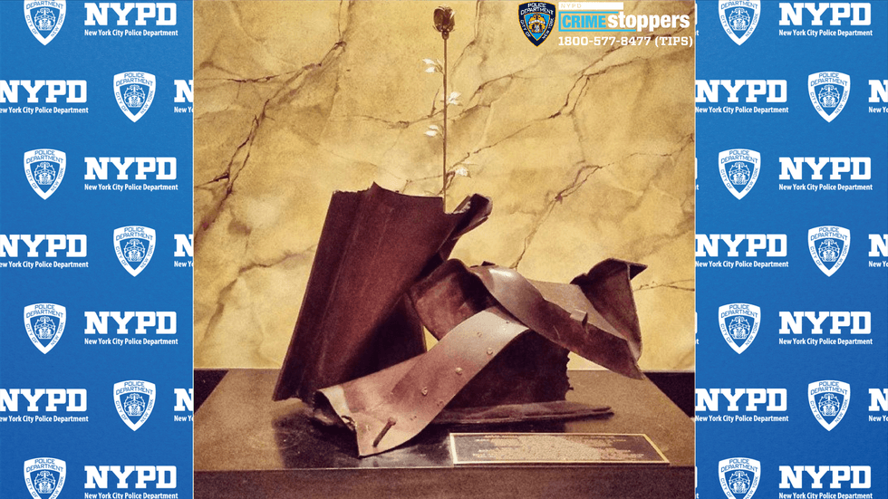 The rose was stolen from the 9/11 memorial at the Church of St. Francis of Assisi