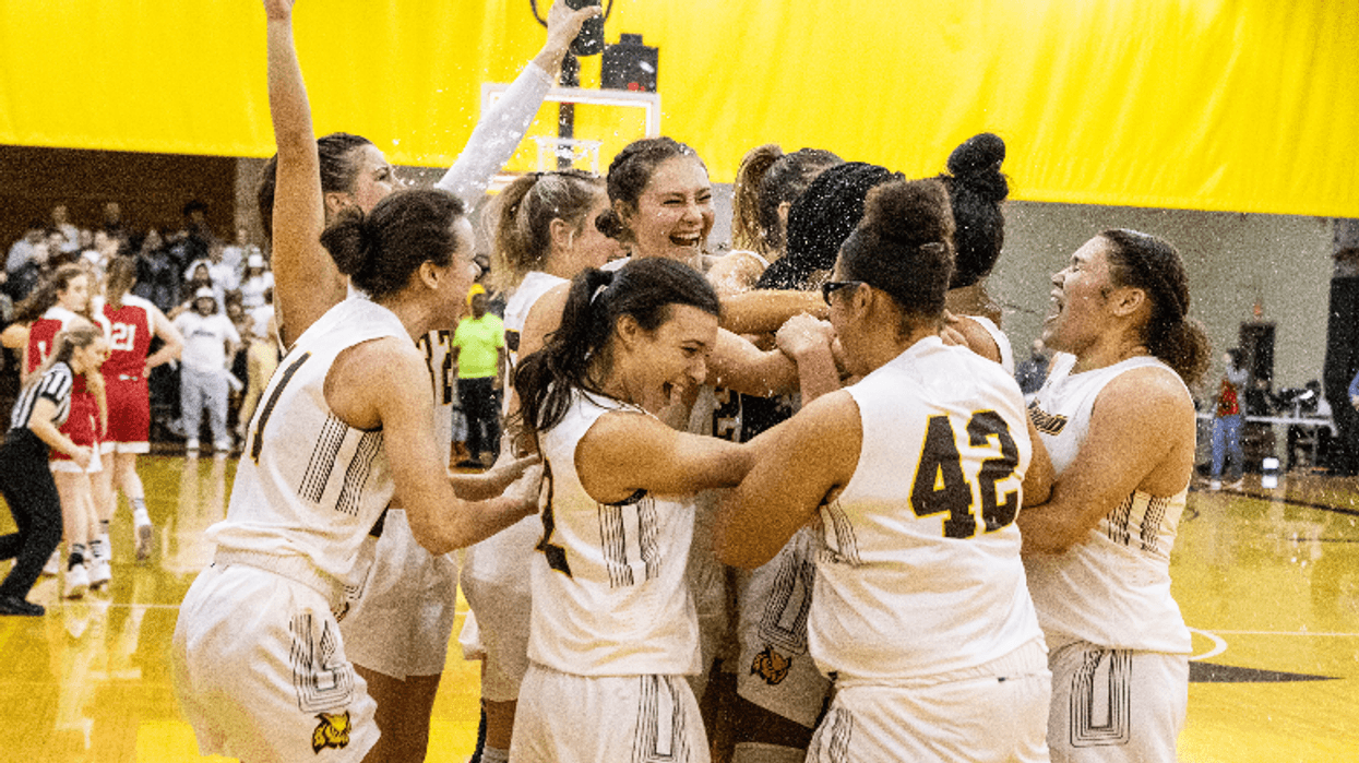The Rowan University women's basketball team celebrates it's New Jersey Athletic Conference title.